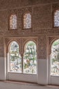 Nice arch windows in ancient Arabian palace Alhambra. Granada, Spain Royalty Free Stock Photo