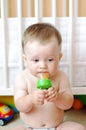 Nice baby eats by using nibbler Royalty Free Stock Photo