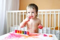 Nice baby with paints