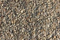Nice background image of pebbles on a beach. Wall pattern of gravel stone. Royalty Free Stock Photo