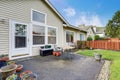 Nice backyard with patio and chairs. Royalty Free Stock Photo