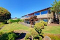 Nice backyard with space, covered patio and beautiful garden. Royalty Free Stock Photo