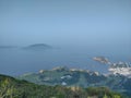 Nice beach city view hiking mountain peak high in Hong Kong Sai Kung Dragon& x27;s back shek O peak Royalty Free Stock Photo