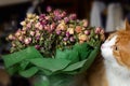 Nice bouquet of dried roses and red cat Royalty Free Stock Photo