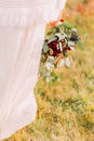 Nice bridal bouquet with berries and green branches close up