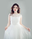 Nice bride woman wearing fashionable wedding dress