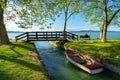 nice bridge with a small canal in Balatonbolar and fishng boats next to Lake Balaton