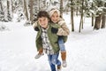 Nice brother and sister Children having fun in winter season Royalty Free Stock Photo
