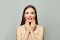 Nice brunette woman showing her hands with red manicured nails. Body care and manicure concept Royalty Free Stock Photo