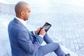 Nice businessman sitting on the stairs Royalty Free Stock Photo