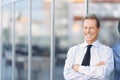 Nice businessman standing near office building Royalty Free Stock Photo