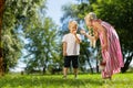 Nice children eating fruits in the park