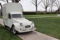 Nice Classic Citroen 2cv gray van on a garden