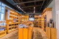 nice closeup view of various wine on wooden shelf`s inside cozy wine store