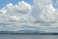 Nice clouds over lake with mountain Royalty Free Stock Photo