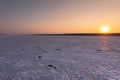 Salt desert sunset view with nice colored sunset background