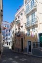 Nice and colorful narrow street at Lisbon, Portugal, Royalty Free Stock Photo