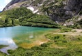 Nice colours of Fedaia Lake in Italian Dolomites Royalty Free Stock Photo