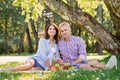 Nice couple having a great time in the park. Royalty Free Stock Photo