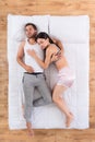 Nice couple sleeping together on bed Royalty Free Stock Photo