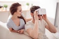 Nice couple using virtual reality device Royalty Free Stock Photo