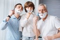 Nice delighted family shaving together