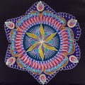 Beautiful painted mandala on black background