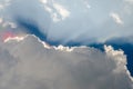 Nice dramatic sky, Iridescence over clouds with sun ray shine