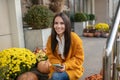 Nice elated woman having her smartphone in the hands