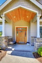 Nice entrance porch of a luxury beige house. Royalty Free Stock Photo