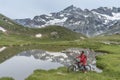 Woman on e mountain bike in the mountains of Zermatt Royalty Free Stock Photo