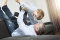 Nice family sit on the livingroom sofa Royalty Free Stock Photo