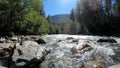 nice fast mountain river with clear water at summer day - photo of nature Royalty Free Stock Photo