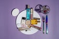 Nice, FRANCE - 21.05.2021 Aesthetic photo. Cosmetic makeup set on the plate on the table as lunch. Powder, lipstick Royalty Free Stock Photo