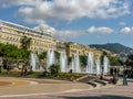 Nice, France - April 1 2010: Origianl water feature garden in main square of Nice with tourists moving around the famous square Royalty Free Stock Photo