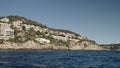 Nice, France, 12 March, 2023: View of houses on a cliffs near Nice, France view from a boat Royalty Free Stock Photo