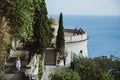 NICE, FRANCE - JUNE 26, 2017: Woman goes down the stairs to the observation deck in Castle Hill or Colline du Chateau park in Nice