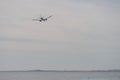 Nice, France - March 8 2023: Emirates Boeing 777 300ER approaching Cote dAzur aiport