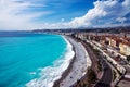 Panorama. Azure sea, waves, English promenade and people resting. Rest and relaxation by the sea.