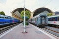 Passenger local and high speed TGV trains stand by the platforms Royalty Free Stock Photo