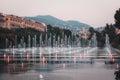 The illuminated Miroir d`eau fountain on the promenade du Paillon in the center of Nice