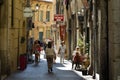 People go a narrow street Royalty Free Stock Photo