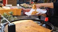 Nice, France, 25th of February 2020: Farinata or Cecina or Torta di ceci thin unleavened pancake Royalty Free Stock Photo