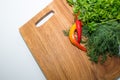 Nice fresh spices isolated on white background.wooden board with vegetables, hot red pepper and dill.herbs on a wooden Royalty Free Stock Photo