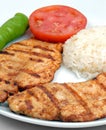 Nice fryied Chicken with rice and tomato