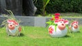 Nice funny welcome figure in asian tropical garden Royalty Free Stock Photo