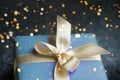 A nice gift for a loved one on a dark festive background Royalty Free Stock Photo