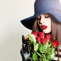 Nice Girl. Beautiful Woman with Rose Flowers Royalty Free Stock Photo