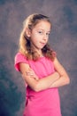 Nice girl with blond hair and pink shirt Royalty Free Stock Photo