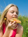 Nice girl eats pizza. lunch Royalty Free Stock Photo